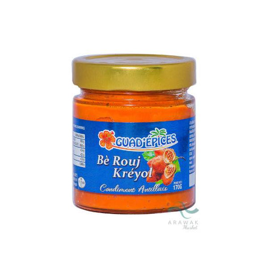 Sauce Bè Rouj Kréyol à utiliser uniquement en cuisson pour la préparation de plats traditionnels: court bouillon de poisson, ragôut, fruits de mer. Pot de 170g.